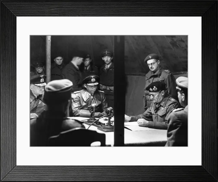 Framed Print : Field Marshal Montgomery (sitting right) reads over the surrender pact at his HQ at 21st Framed Print : Field Marshal Montgomery (sitting right) reads over the surrender pact at his HQ at 21st