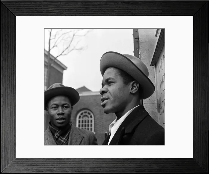 Framed Print : Young West Indian men standing outside the Brixton Labour Exchange looking for employment Framed Print : Young West Indian men standing outside the Brixton Labour Exchange looking for employment