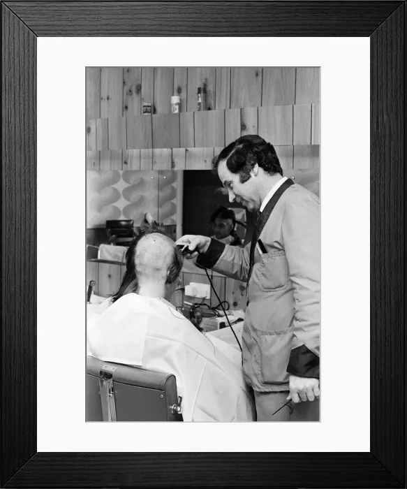 Framed Print : A man getting a Kojak'hair cut. 1975 Framed Print : A man getting a Kojak'hair cut. 1975