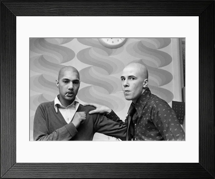 Framed Print : Two men with Kojak'hair cuts. 1975 Framed Print : Two men with Kojak'hair cuts. 1975