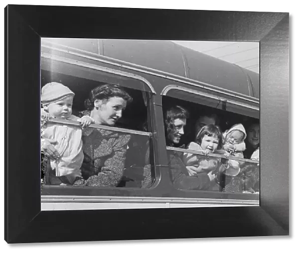 Mothers and their young babies on a Coventry bus circa 1958