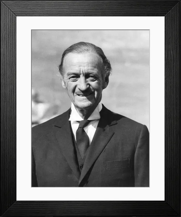 Framed Print : David Niven dressed as butler while filming Candleshoe in England - September 1976 Framed Print : David Niven dressed as butler while filming Candleshoe in England - September 1976