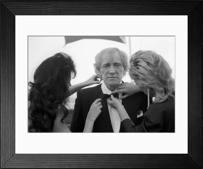 Framed Print : Richard Harris being dressed in black tie on the set of Maigret - March 1988 Framed Print : Richard Harris being dressed in black tie on the set of Maigret - March 1988