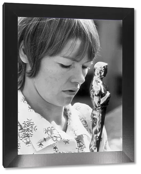 Glenda Jackson holds her Oscar for best actress which was presented to her at a