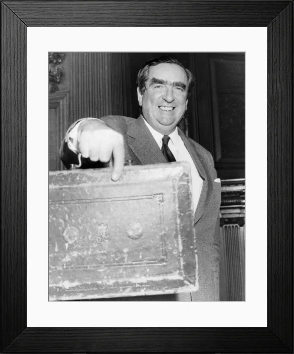 Framed Print : Denis Healey holding up budget box - March 1976 31 / 03 / 1976 Framed Print : Denis Healey holding up budget box - March 1976 31 / 03 / 1976