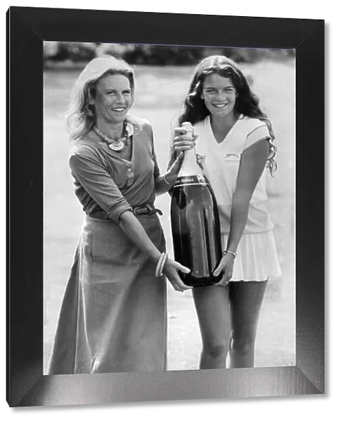Annabel Croft and her mother Susan carrying a Salmanazar of champagne (same as 12 bottles