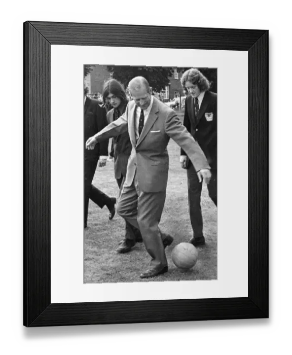 Framed Print : Duke of Edinburgh, Prince Philip plays football during a visit to Bellingham Sports Framed Print : Duke of Edinburgh, Prince Philip plays football during a visit to Bellingham Sports
