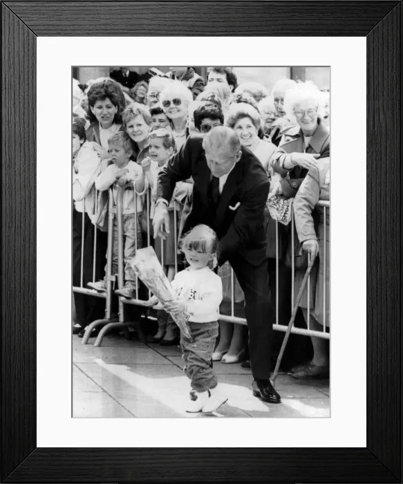 Framed Print : The Duke picks Pauline Smith from the crowd & points her in the direction of the Queen Framed Print : The Duke picks Pauline Smith from the crowd & points her in the direction of the Queen
