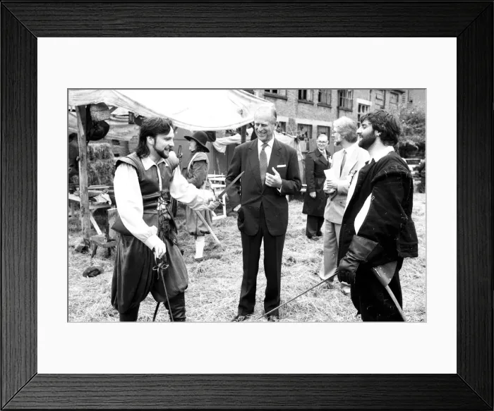 Framed Print : The Duke of Edinburgh visits a film set, chatting to an actors - 17 / 7 / 1987 Framed Print : The Duke of Edinburgh visits a film set, chatting to an actors - 17 / 7 / 1987