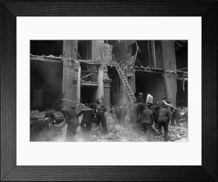 Framed Print : A rescue by the National Fire Service when a flying bomb crashed on flats at Nevern Framed Print : A rescue by the National Fire Service when a flying bomb crashed on flats at Nevern