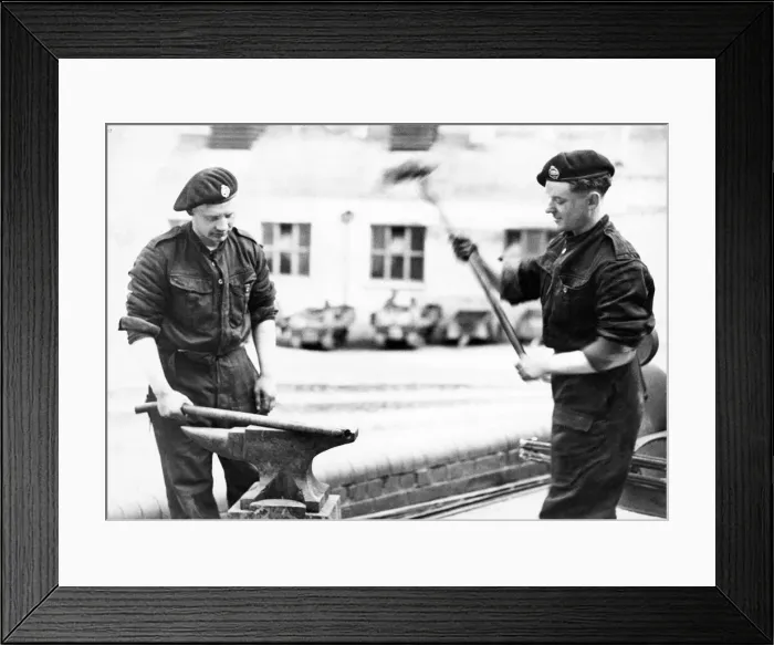 Framed Print : The village blacksmith in a new setting. Tank Corps members carrying out repairs on an Framed Print : The village blacksmith in a new setting. Tank Corps members carrying out repairs on an