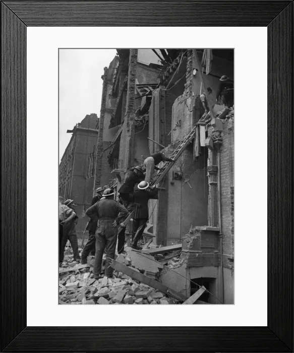 Framed Print : A rescue by the National Fire Service when a flying bomb crashed on flats at Nevern Framed Print : A rescue by the National Fire Service when a flying bomb crashed on flats at Nevern