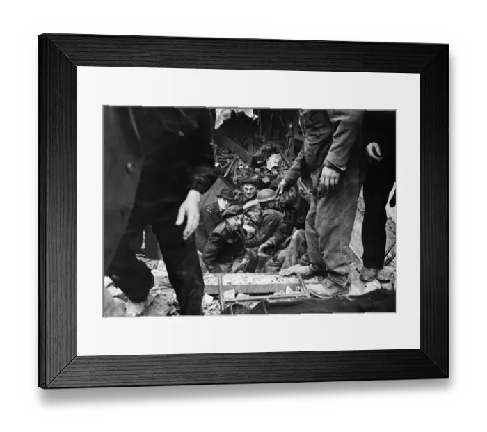 Framed Print : C. D workers helping a causality from blitzed premises after his rescue Framed Print : C. D workers helping a causality from blitzed premises after his rescue