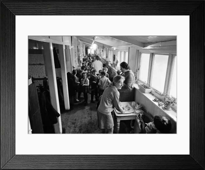 Framed Print : Some of the 180 children play in the small corridor at Sacred Heart RC school, Gorton Framed Print : Some of the 180 children play in the small corridor at Sacred Heart RC school, Gorton