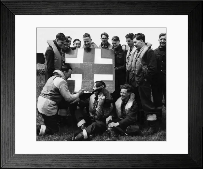 Framed Print : A fragment cut from an enemy aircraft which the RAF squadron shot down is used for Framed Print : A fragment cut from an enemy aircraft which the RAF squadron shot down is used for