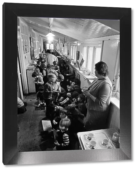 Some of the 180 children play in the small corridor at Sacred Heart RC school, Gorton