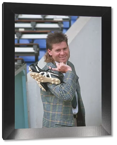 CHRIS WADDLE holding football boots 11  /  07  /  1989