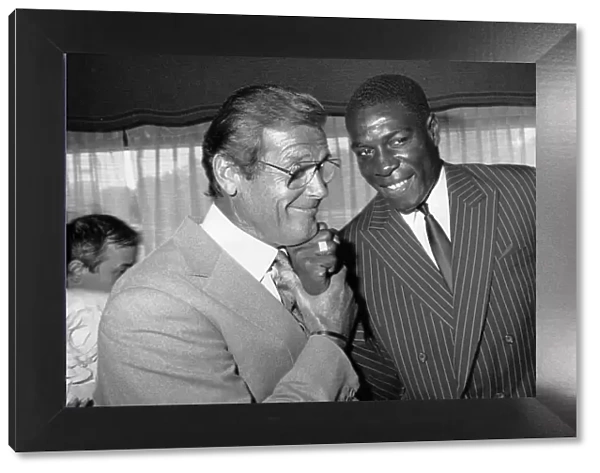 Frank Bruno and Roger Moore at Variety Club Awards party - 27  /  06  /  1989