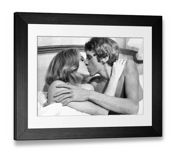 Framed Print : Michael Crawford kissing actress Genevieve Gilles during filming Hello-Goodbye - October