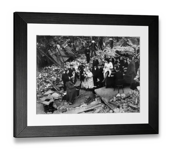 Framed Print : London residents of a bombed out street hold a street party amongst the ruins of their