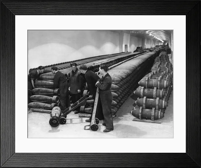 Framed Print : Stockpiles of bombs are loaded for transport from a secret underground munitions dump in Framed Print : Stockpiles of bombs are loaded for transport from a secret underground munitions dump in