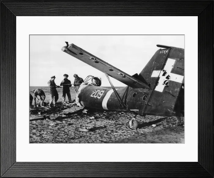 Framed Print : British Effectives examining all that was left of a Junkers Bomber destroyed by an R. A Framed Print : British Effectives examining all that was left of a Junkers Bomber destroyed by an R. A
