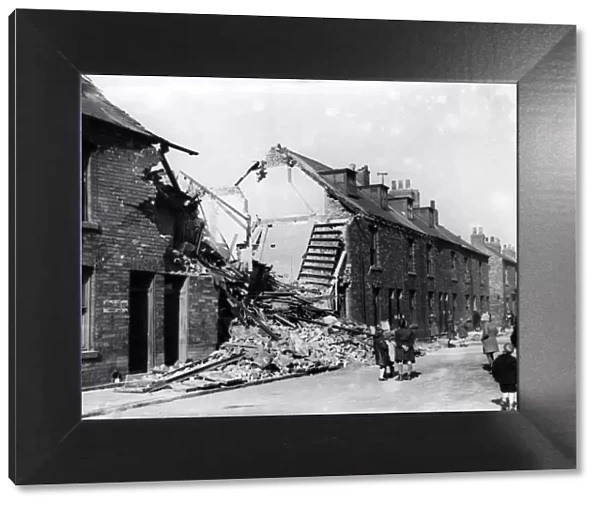 Bomb-shattered homes in Grange Street, Hull. Circa 1941