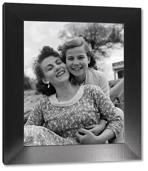 Virgin mother Emmimarie Jones with her daughter Monica. June 1956