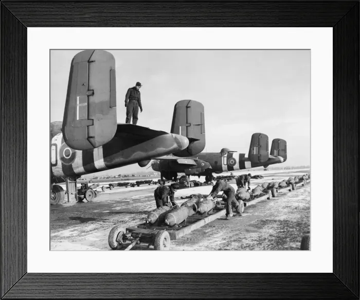 Framed Print : Artic Conditions On Belgium Airfield. R. A. F Ground crews bombing up R. A