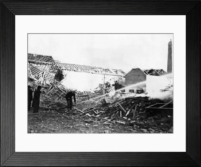 Framed Print : Firemen on a building site during the recent raid on a South Wales town. Circa 1941 Framed Print : Firemen on a building site during the recent raid on a South Wales town. Circa 1941