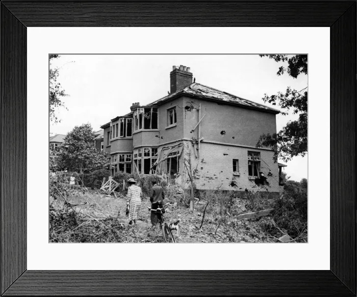 Framed Print : Damaged property in a South Wales town caused by a bomb. Circa 1941 Framed Print : Damaged property in a South Wales town caused by a bomb. Circa 1941