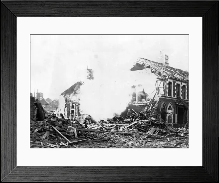Framed Print : A damaged house in Cardiff following an attack by Nazi raiders. Circa 1941 Framed Print : A damaged house in Cardiff following an attack by Nazi raiders. Circa 1941