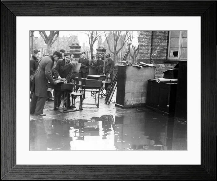 Framed Print : Boys engaged in salvage work from a burnt out school in Cardiff, Wales Framed Print : Boys engaged in salvage work from a burnt out school in Cardiff, Wales