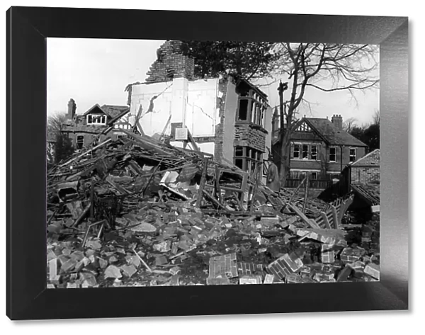 Damage to a house following air raids in Cardiff, Wales. Circa 1941