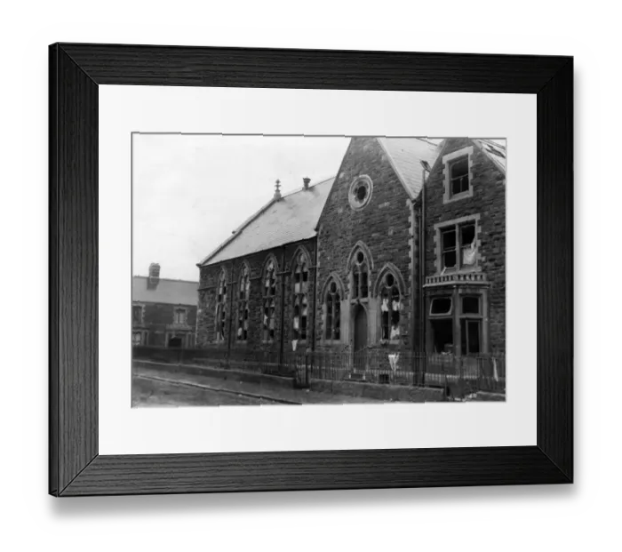 Framed Print : Windows broken at a chapel during an air raid on a South Wales town. Circa 1941 Framed Print : Windows broken at a chapel during an air raid on a South Wales town. Circa 1941