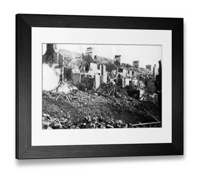 Framed Print : Dwellings damaged following a Nazi raid on a South Wales town. Circa 1941 Framed Print : Dwellings damaged following a Nazi raid on a South Wales town. Circa 1941