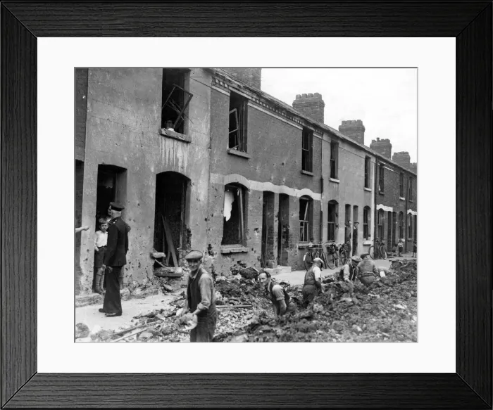Framed Print : Damage done to a street in the suburbs of Cardiff. Circa 1941 Framed Print : Damage done to a street in the suburbs of Cardiff. Circa 1941