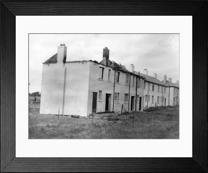 Framed Print : Damaged house in South Wales following an attack by Nazi raiders. Circa 1941 Framed Print : Damaged house in South Wales following an attack by Nazi raiders. Circa 1941