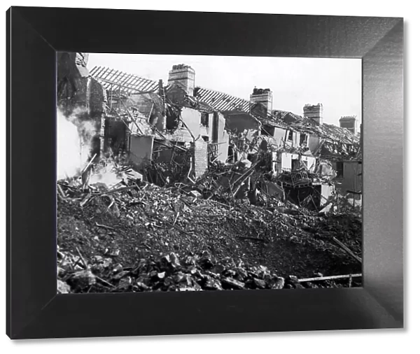 Damage caused to De Burgh Street, Cardiff, following an air-raid attack. Circa 1941