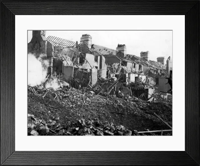 Framed Print : Damage caused to De Burgh Street, Cardiff, following an air-raid attack. Circa 1941 Framed Print : Damage caused to De Burgh Street, Cardiff, following an air-raid attack. Circa 1941