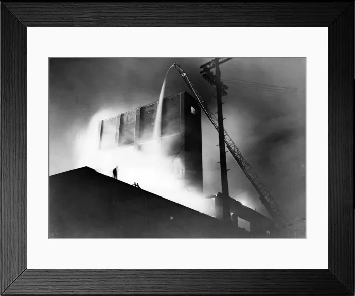 Framed Print : Fire at Adam Street, Cardiff, following an air raid attack. Circa 1941 Framed Print : Fire at Adam Street, Cardiff, following an air raid attack. Circa 1941