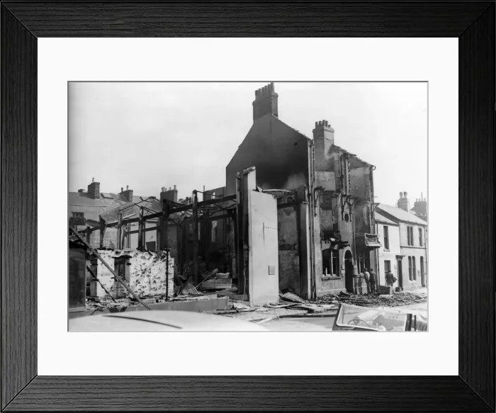 Framed Print : A damaged house following the attacks on Swansea, Wales, by Nazi raiders. February 1941 Framed Print : A damaged house following the attacks on Swansea, Wales, by Nazi raiders. February 1941