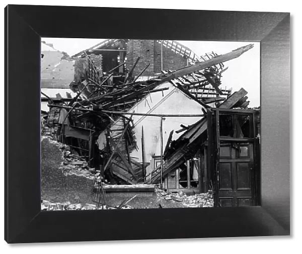 Damaged houses following air raid attacks in Newport, Wales. October 1940