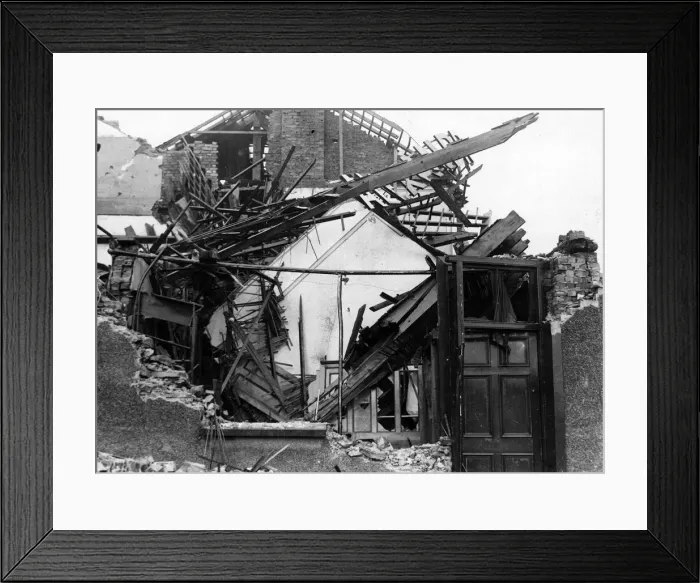 Framed Print : Damaged houses following air raid attacks in Newport, Wales. October 1940