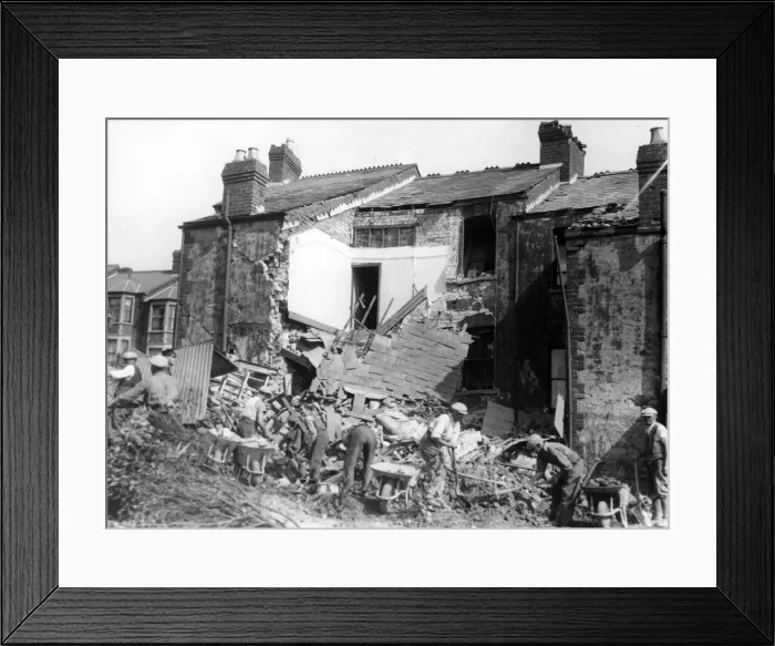 Framed Print : The front of this house was blown out when a bomb was dropped, South Wales