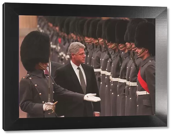 BILL CLINTON, US PRESIDENT, INSPECTING THE TROOPS AT BUCKINGHAM PALACE DURING HIS VISIT
