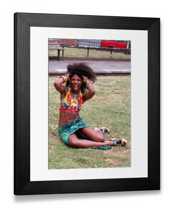 Framed Print : SINITTA SITTING IN PARK WITH HER HANDS IN HER HAIR IN PROMOTIONAL HAIR PHOTOCALL Framed Print : SINITTA SITTING IN PARK WITH HER HANDS IN HER HAIR IN PROMOTIONAL HAIR PHOTOCALL