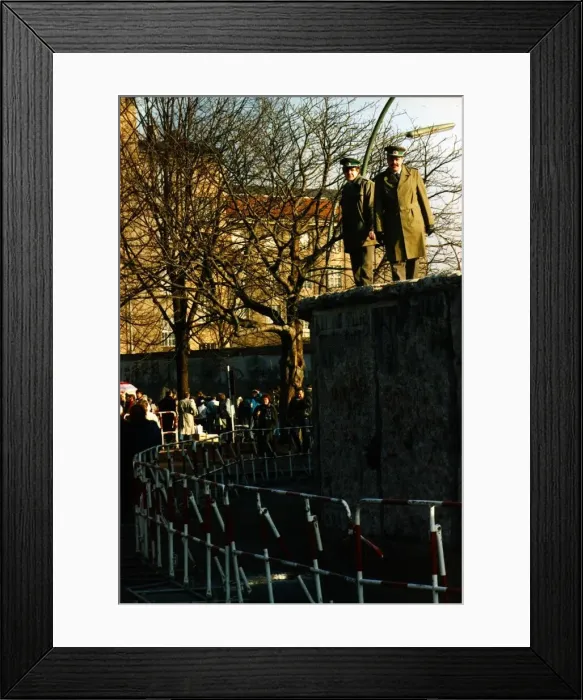 Framed Print : EAST GERMAN BORDER GUARDS ON TOP OF THE BERLIN WALL IN FEBRUARY 1990 - 15  /  02  /  1990