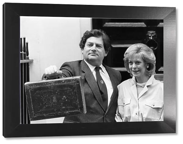 CHANCELLOR OF THE EXCHEQUER NIGEL LAWSON WITH HIS WIFE THERESE ON BUDGET DAY OUTSIDE
