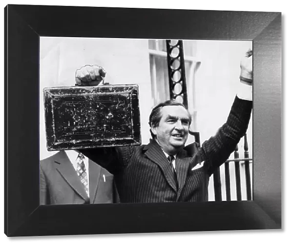 Denis Healey, Chancellor of the Exchequer, leaving 11 Downing Street holding the budget